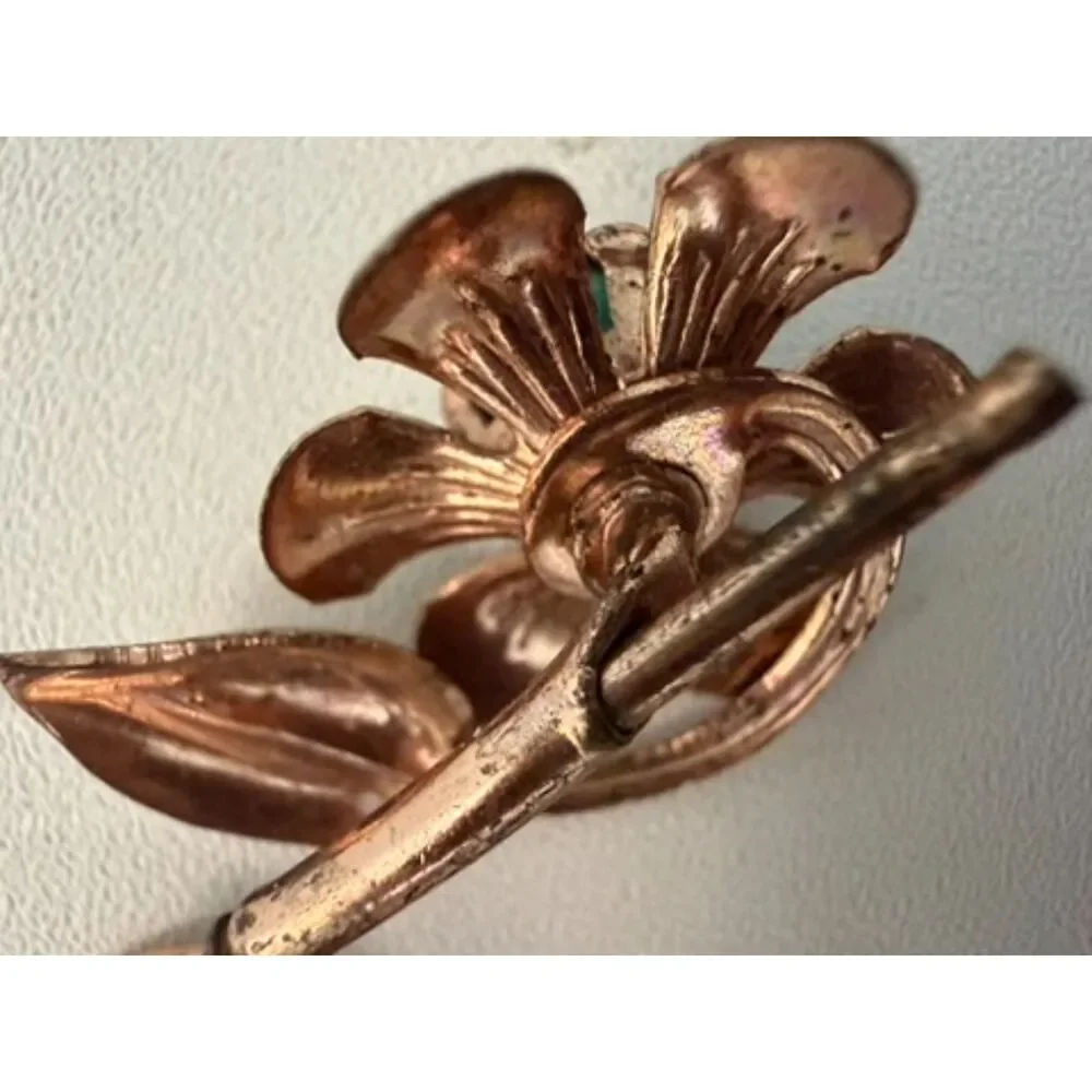 Vintage Button hole/cuff link Gold flowers with emerald centers.